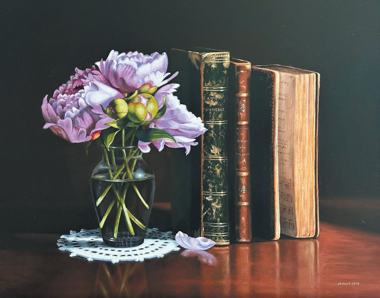 An image of flower pot and book