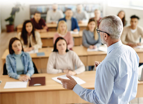 Teacher giving a lecture to a classroom