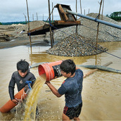 miners sift for gold in the riverbeds of the peruvian amazon